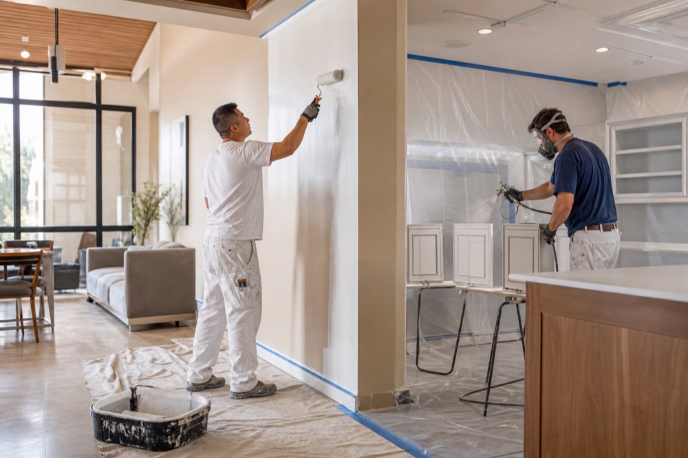 Painting + finishes service professional at work